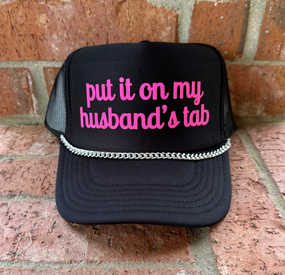 Put It On My Husband's Tab Trucker Hat