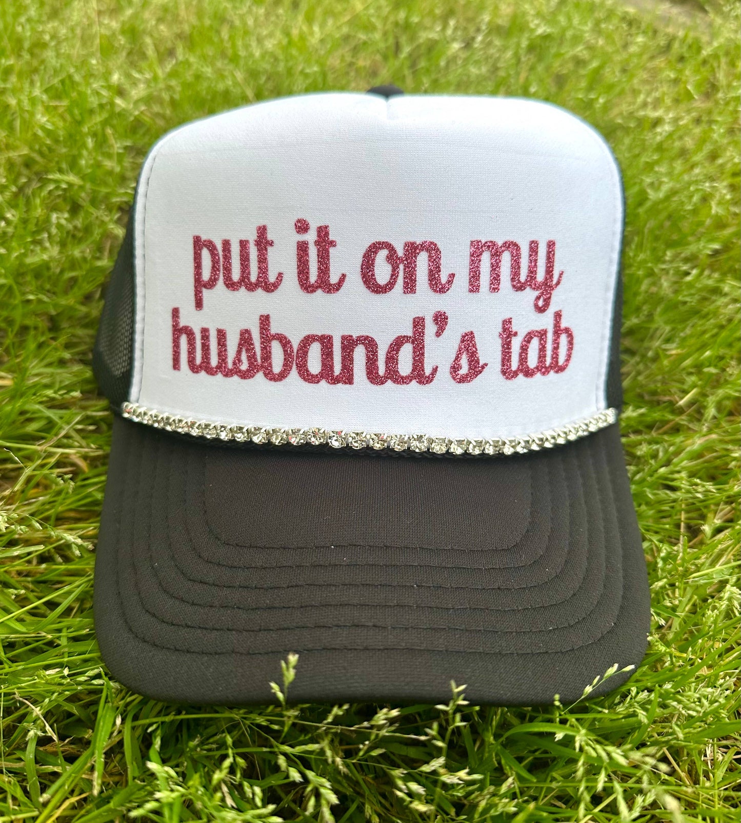 Put It On My Husband's Tab Trucker Hat