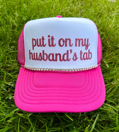 Put It On My Husband's Tab Trucker Hat